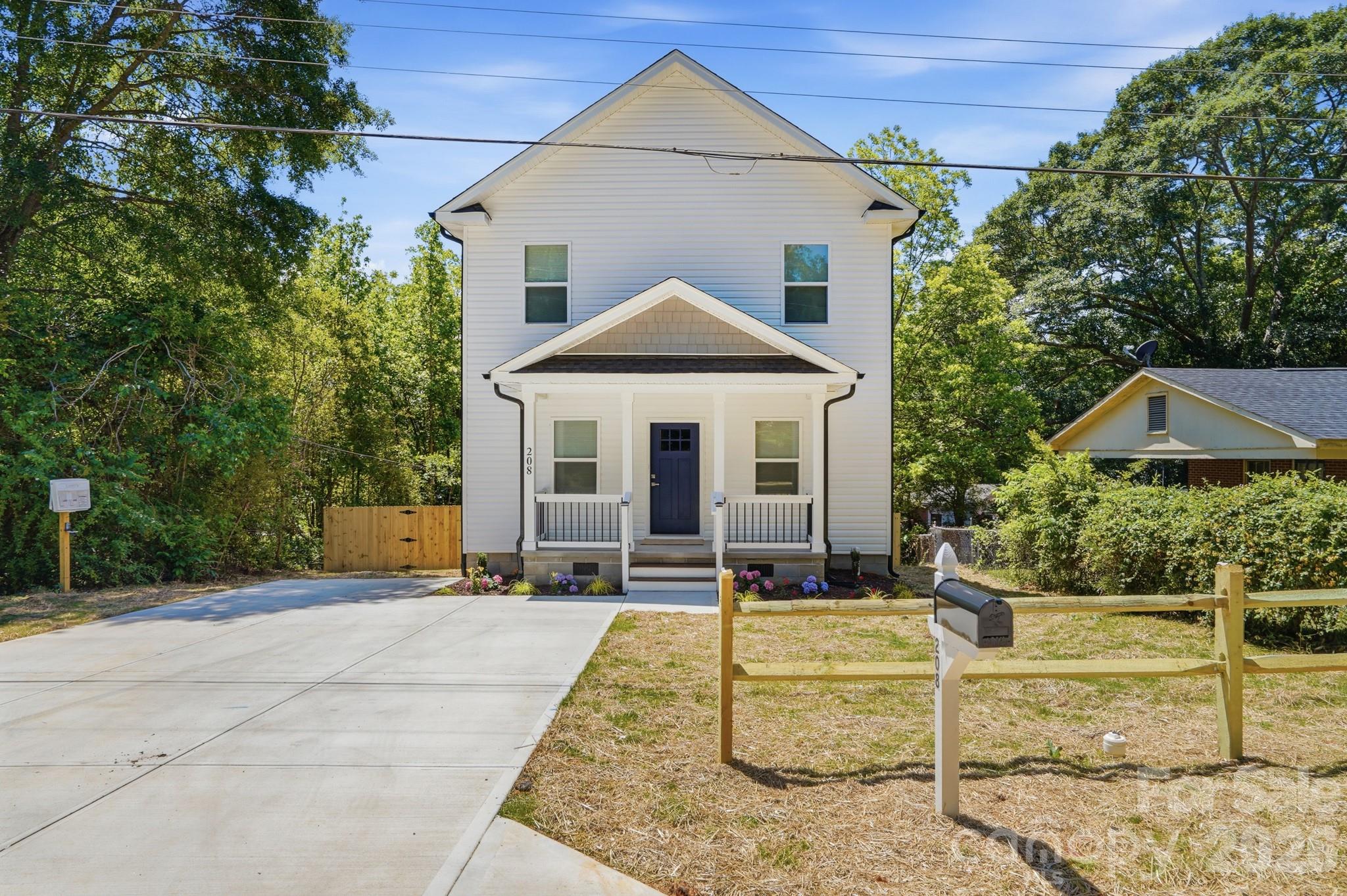 208 Wylie Park Road Lancaster, SC 29720 - Photo 2 of 48 a front view of a house with a yard