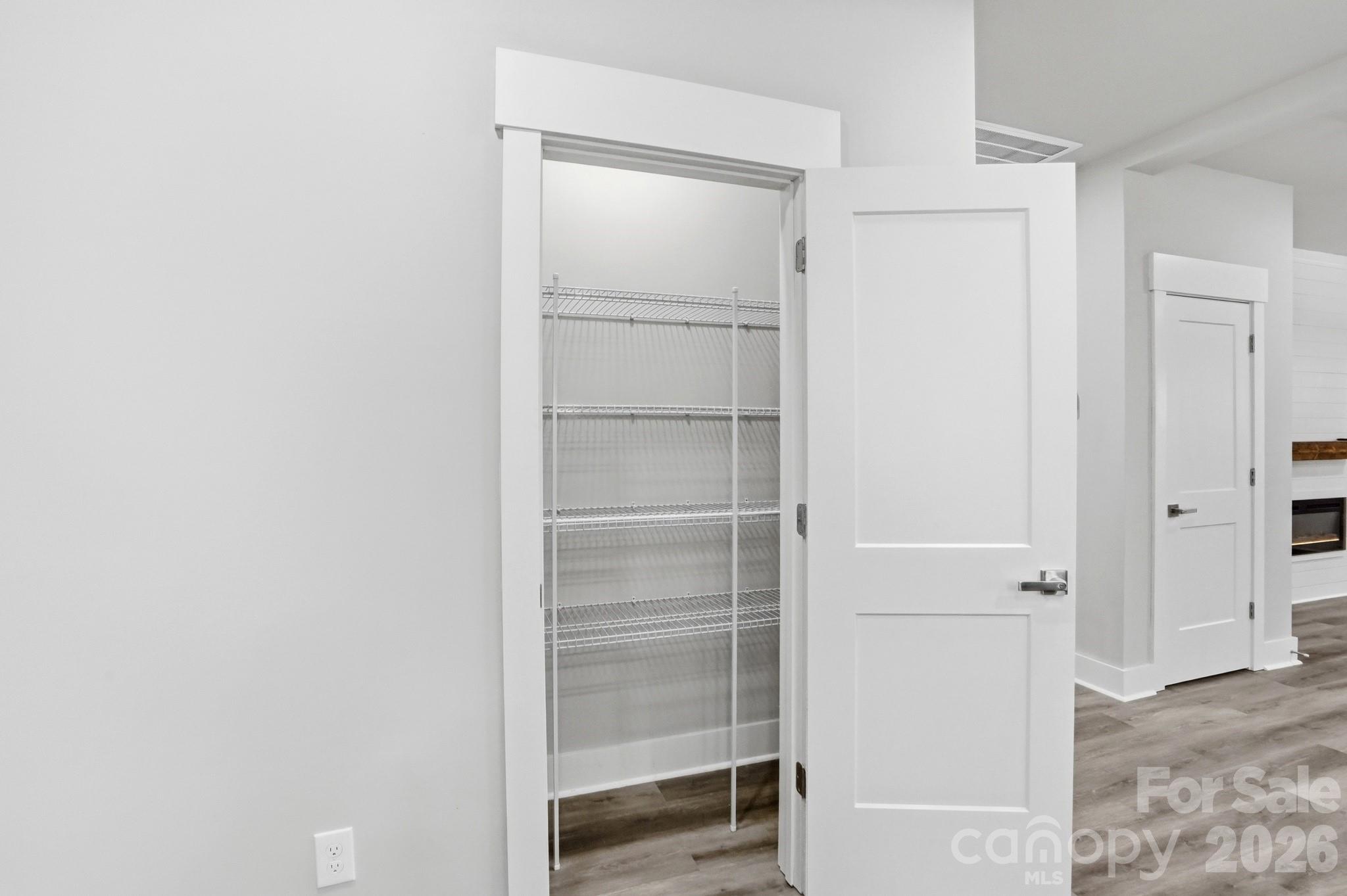208 Wylie Park Road Lancaster, SC 29720 - Photo 21 of 48 a view of walk in closet with empty racks