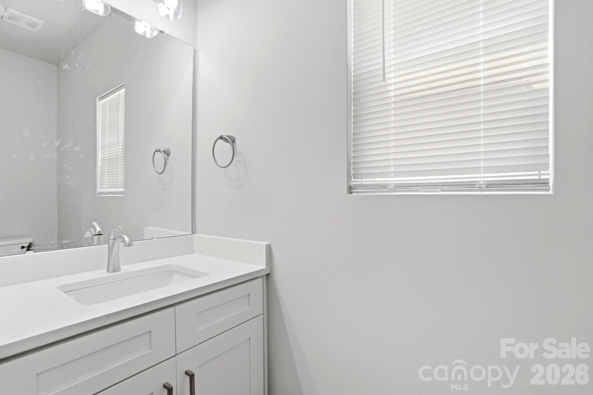 208 Wylie Park Road Lancaster, SC 29720 - Photo 23 of 48 a bathroom with a sink and a mirror
