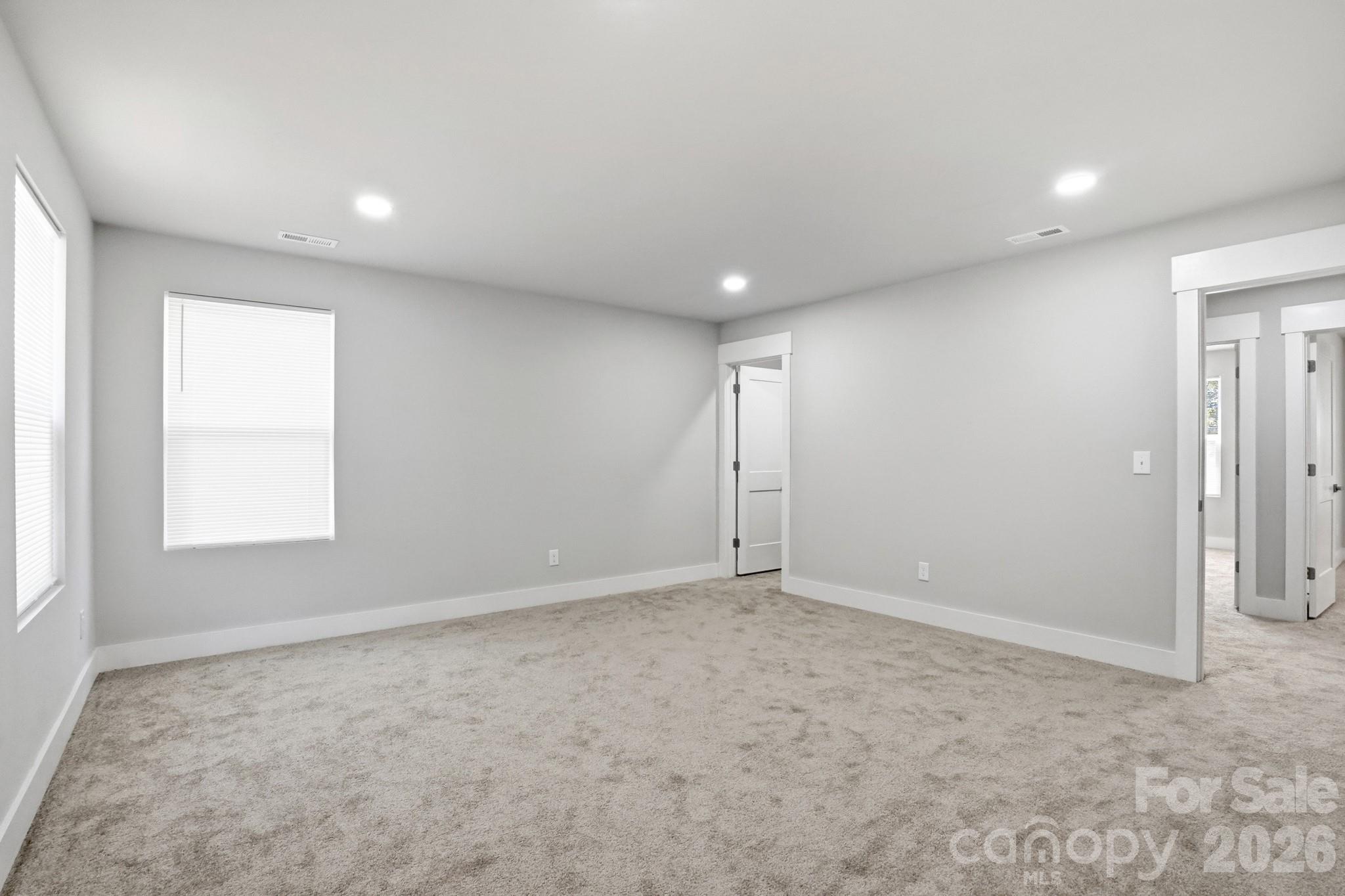 208 Wylie Park Road Lancaster, SC 29720 - Photo 28 of 48 an empty room with windows