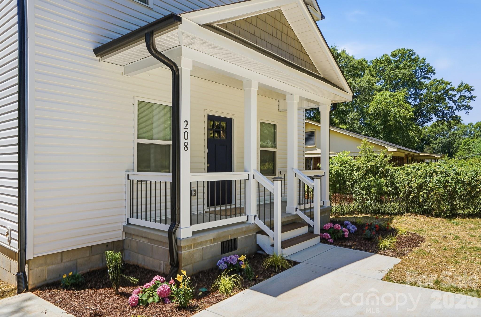 208 Wylie Park Road Lancaster, SC 29720 - Photo 3 of 48 a view of a house with wooden fence