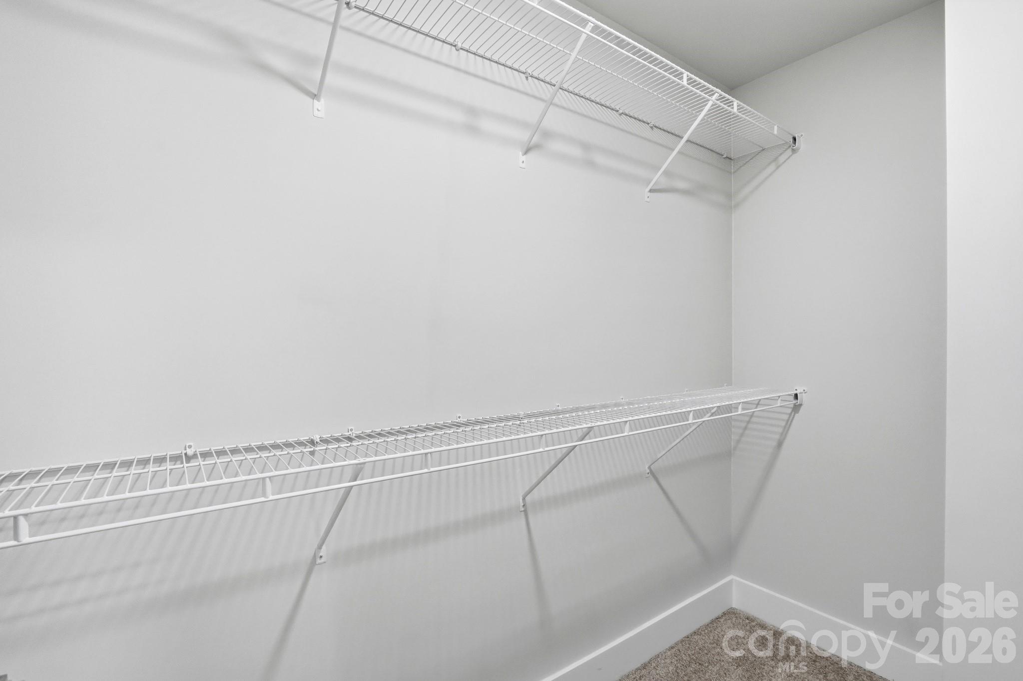 208 Wylie Park Road Lancaster, SC 29720 - Photo 31 of 48 a view of a room with racks on the wall