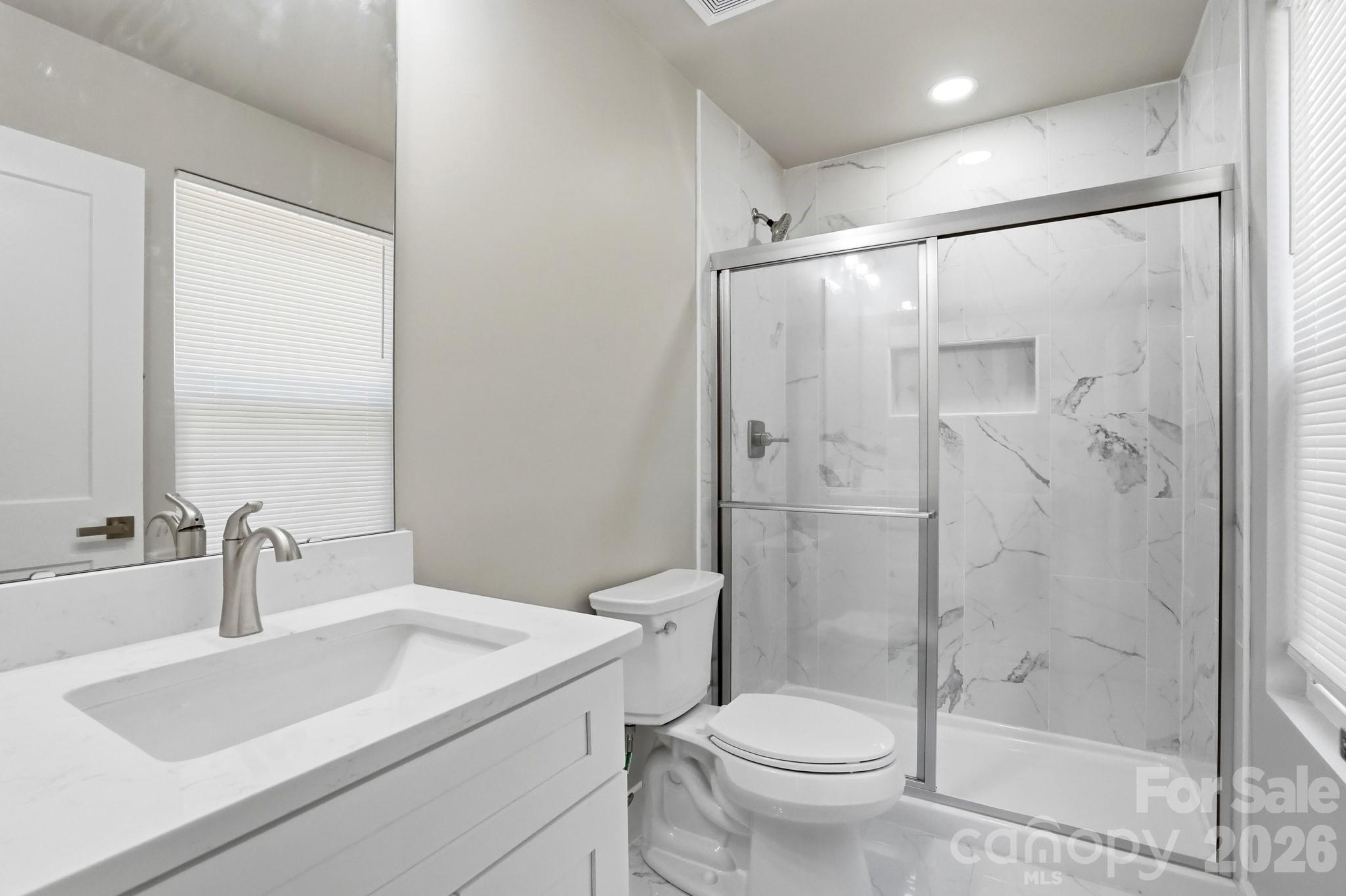 208 Wylie Park Road Lancaster, SC 29720 - Photo 32 of 48 a bathroom with a sink toilet and shower