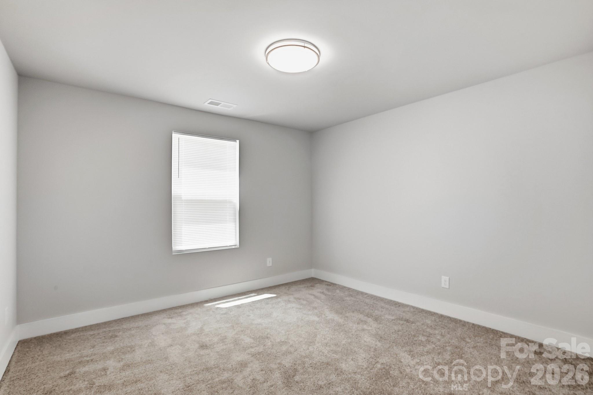 208 Wylie Park Road Lancaster, SC 29720 - Photo 35 of 48 an empty room with a window and closet