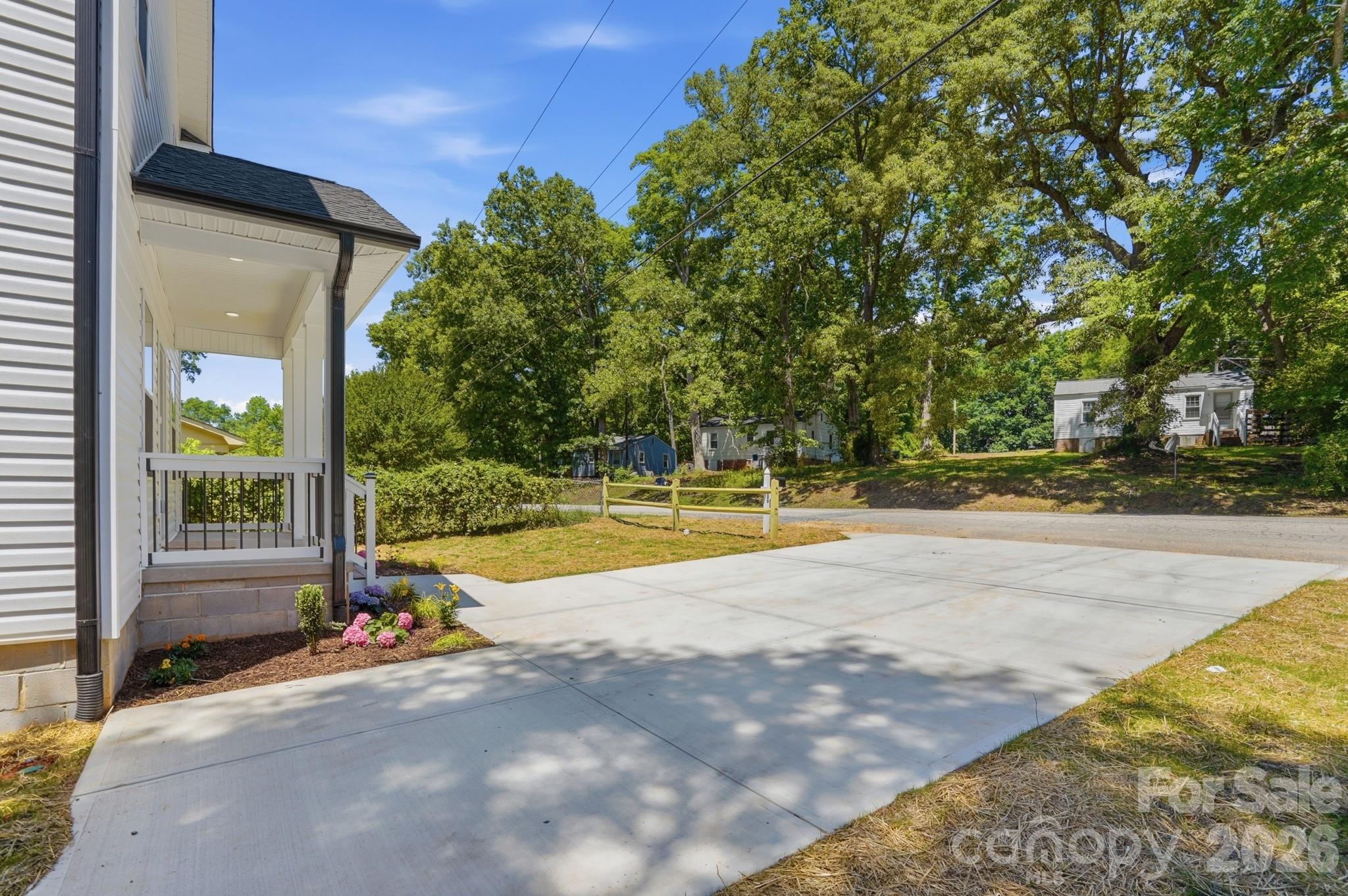 208 Wylie Park Road Lancaster, SC 29720 - Photo 4 of 48 a view of swimming pool with an outdoor space and seating area