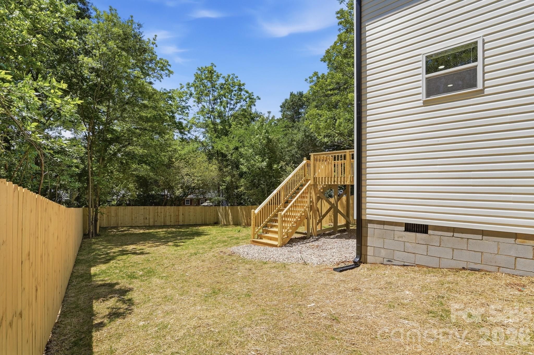 208 Wylie Park Road Lancaster, SC 29720 - Photo 44 of 48 a view of a backyard with a slide