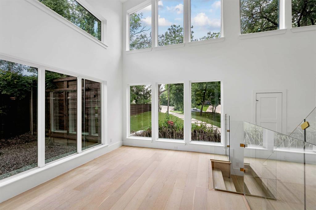 13032 Copenhill Road Dallas, TX 75240 - Photo 14 of 40 a view of backyard with large windows and plants