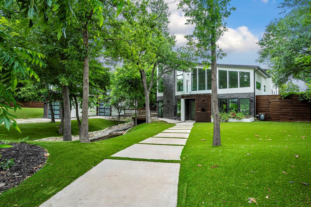 13032 Copenhill Road Dallas, TX 75240 - Photo 2 of 40 a view of house with a yard