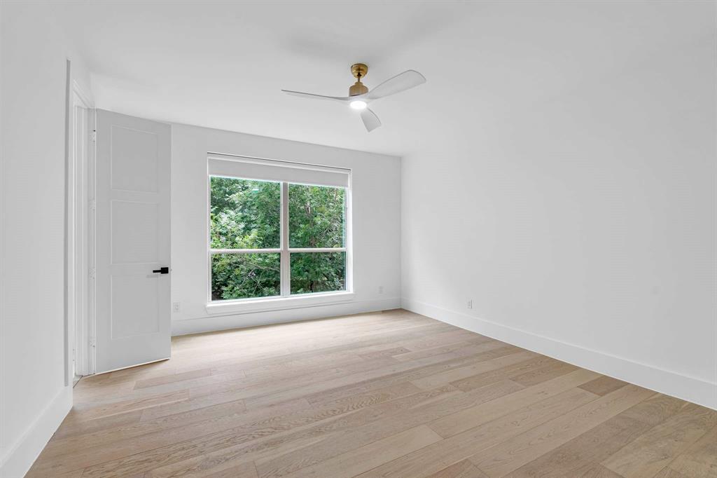 13032 Copenhill Road Dallas, TX 75240 - Photo 28 of 40 a view of an empty room with a window