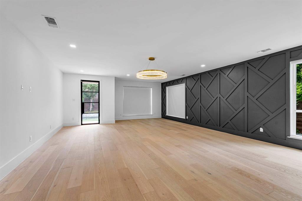 13032 Copenhill Road Dallas, TX 75240 - Photo 5 of 40 a view of an empty room with a window