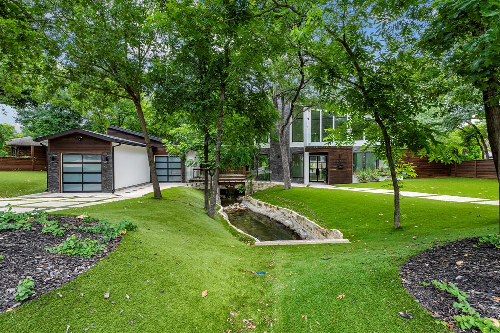 13032 Copenhill Road Dallas, TX 75240 - Photo 7 of 40 a view of a house with a yard porch and sitting area