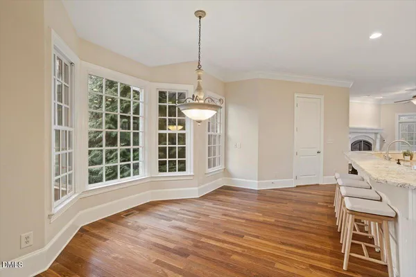 a view of a room with wooden stairs