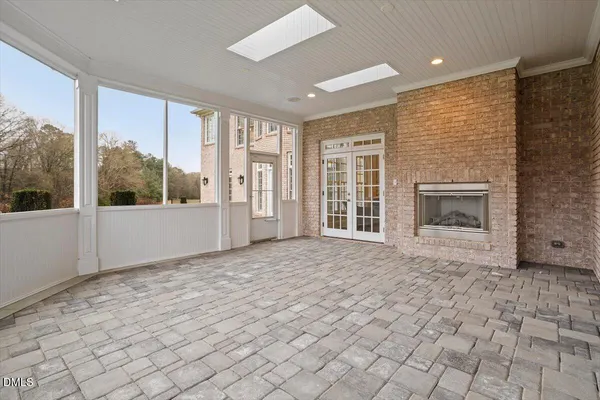 a front view of house with yard outdoor seating and barbeque oven