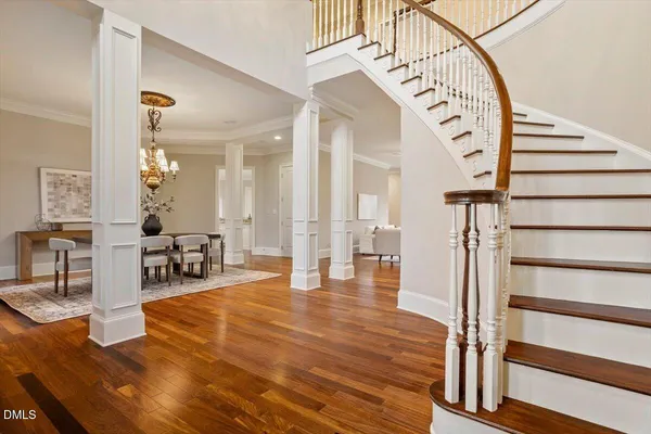a kitchen with stainless steel appliances granite countertop a stove refrigerator sink and cabinets