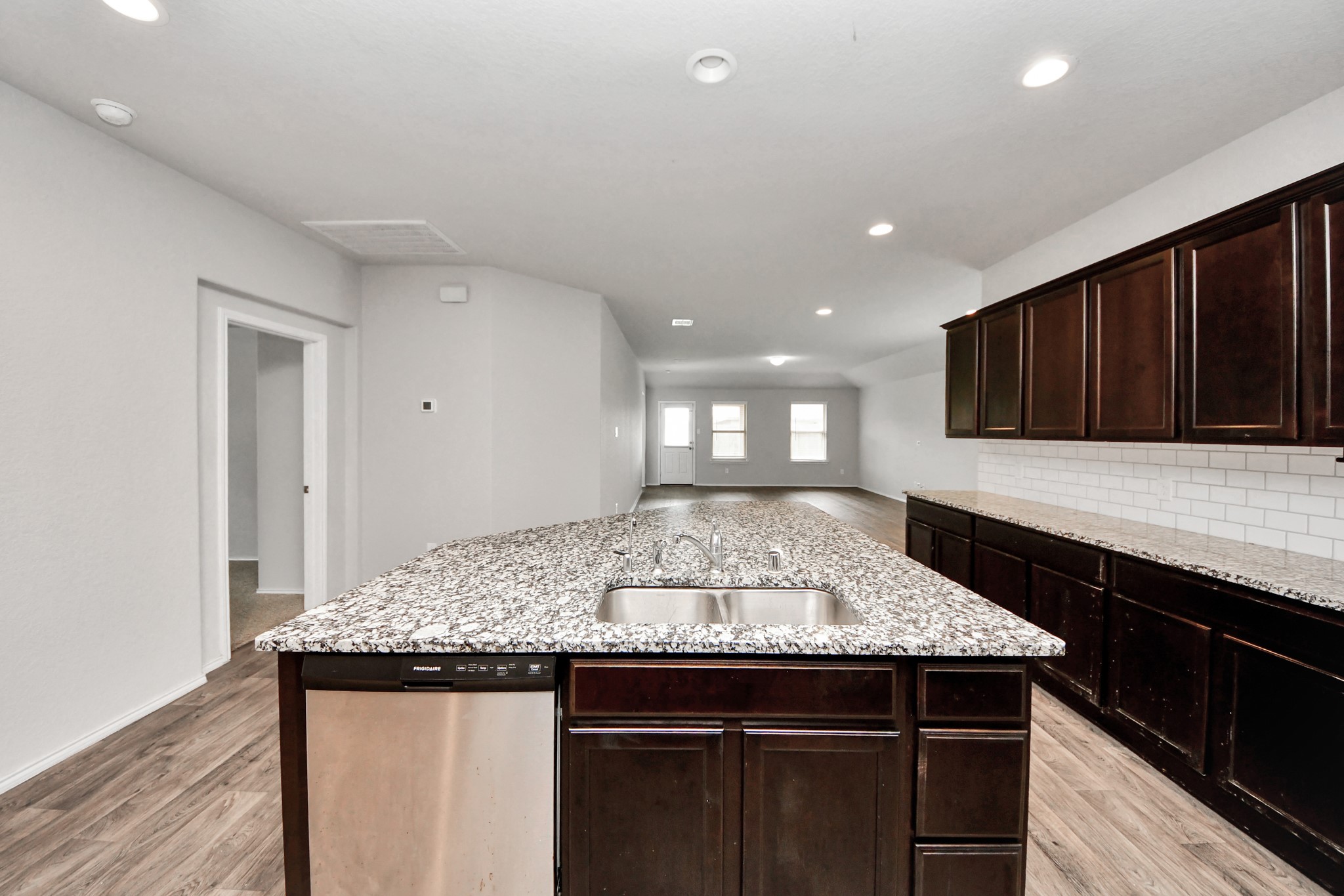 8302 Rose Petals Lane Rosharon, TX 77583 - Photo 13 of 42 Large island with open-concept flow