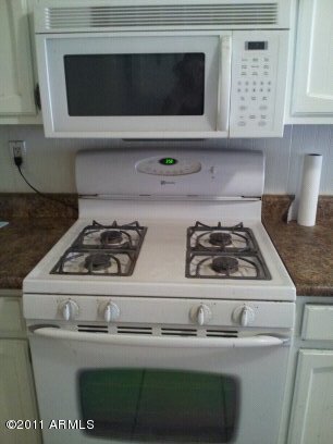430 West Cheery Lynn Road Phoenix, AZ 85013 - Photo 6 of 12 Gas stove and installed microvave