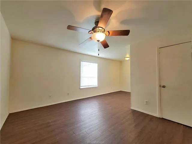 a view of car parked in front of house
