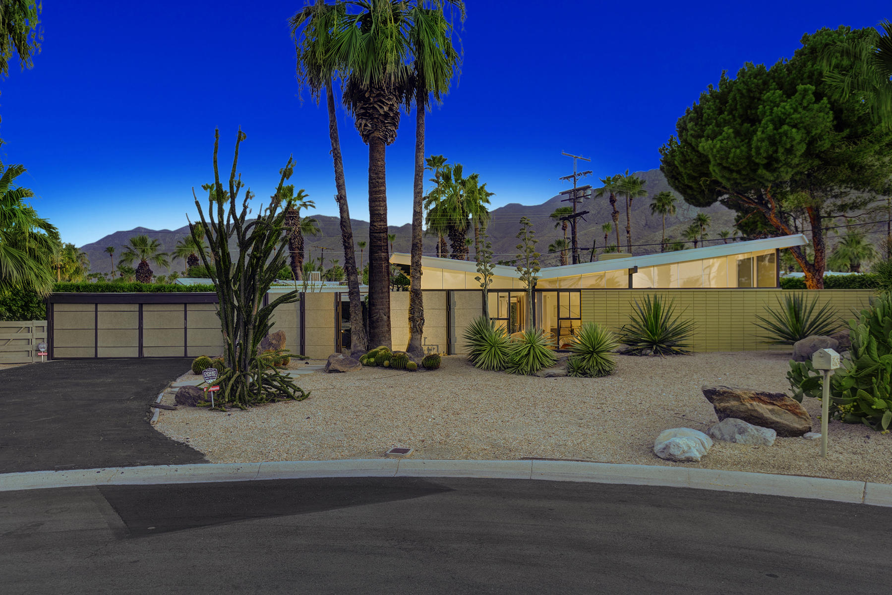 1865 Apache Circle Palm Springs, CA 92264 - Photo 1 of 42 a view of a yard with cars