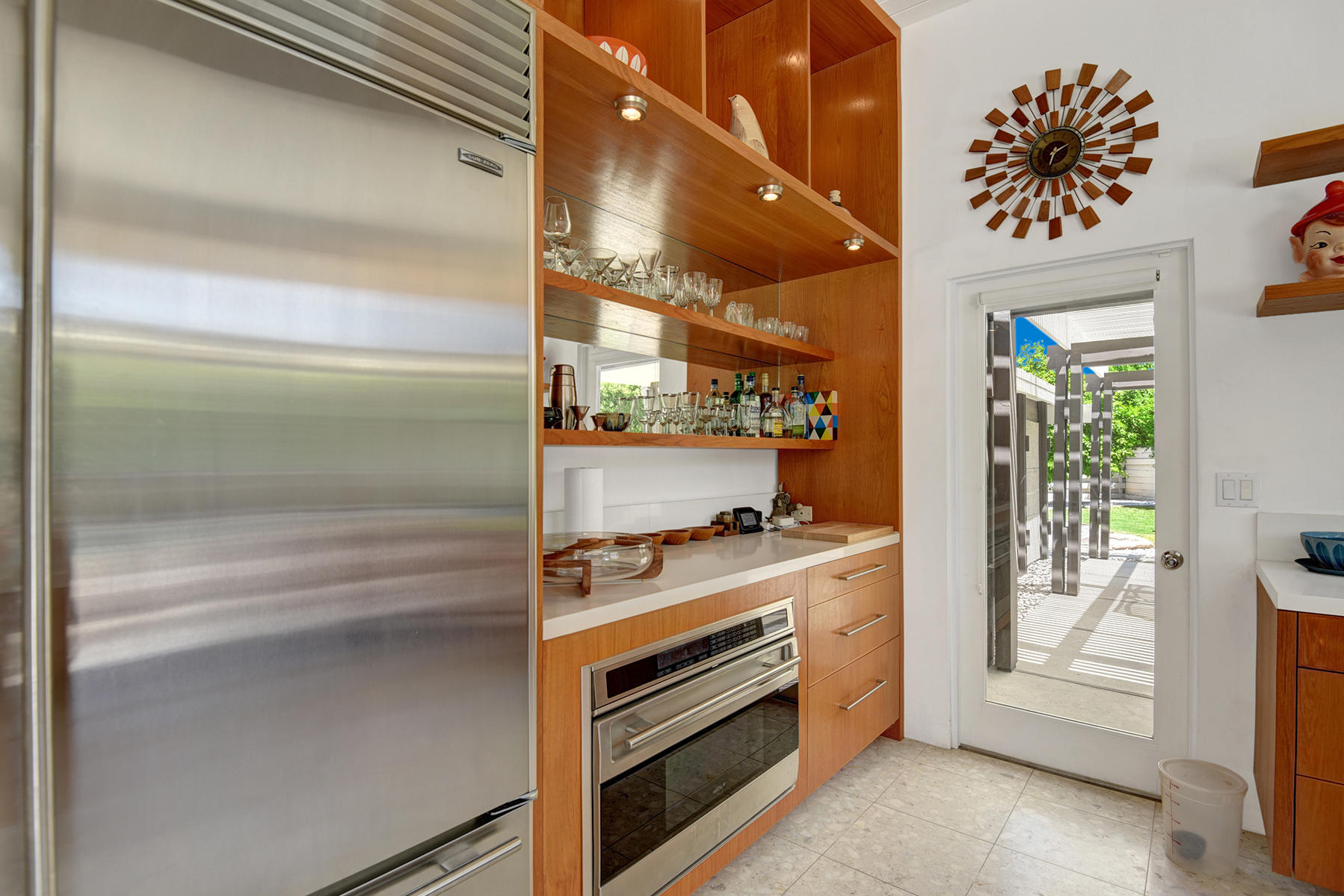 1865 Apache Circle Palm Springs, CA 92264 - Photo 11 of 42 a kitchen with a stove and a microwave