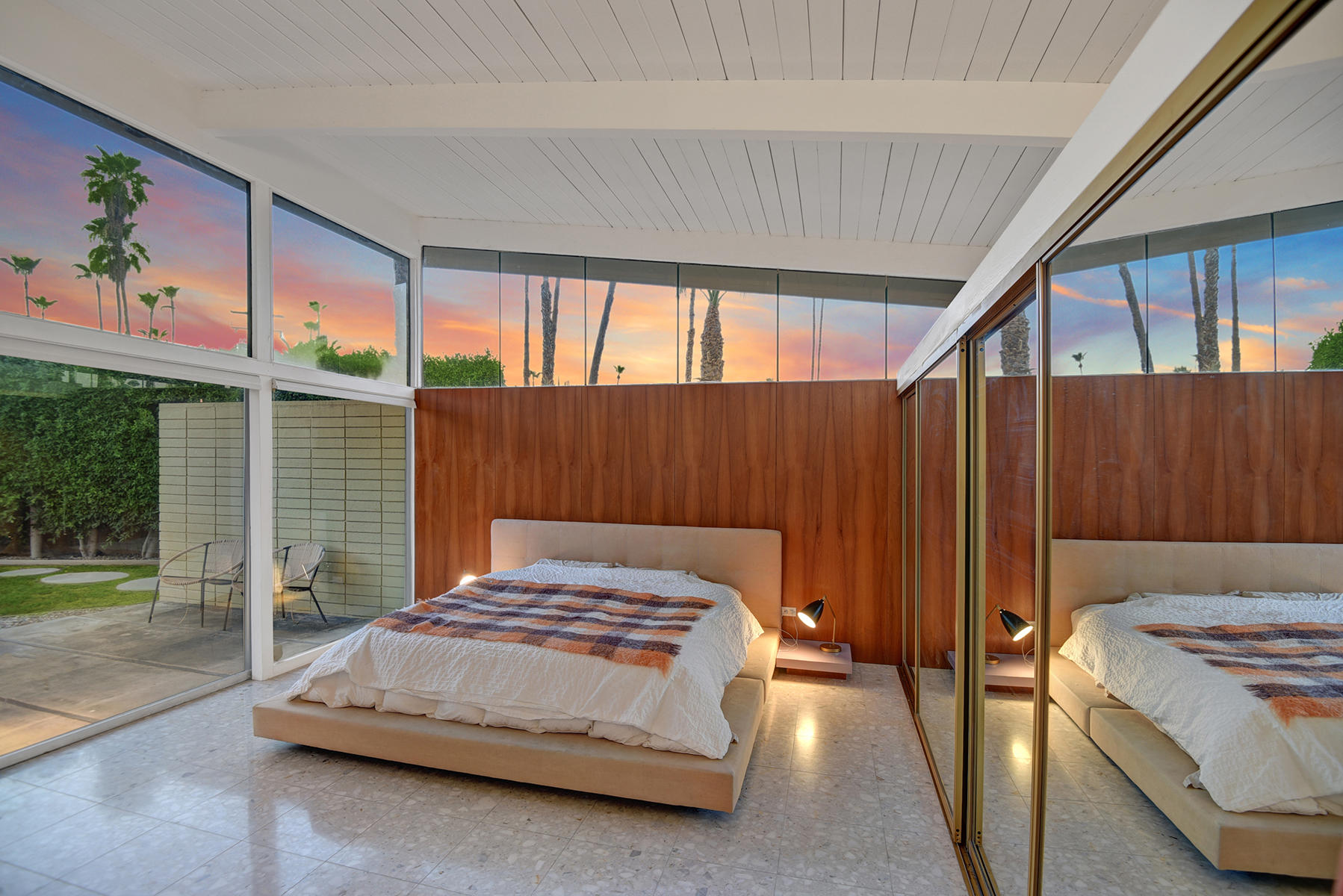 1865 Apache Circle Palm Springs, CA 92264 - Photo 13 of 42 a bedroom with a bed and large window