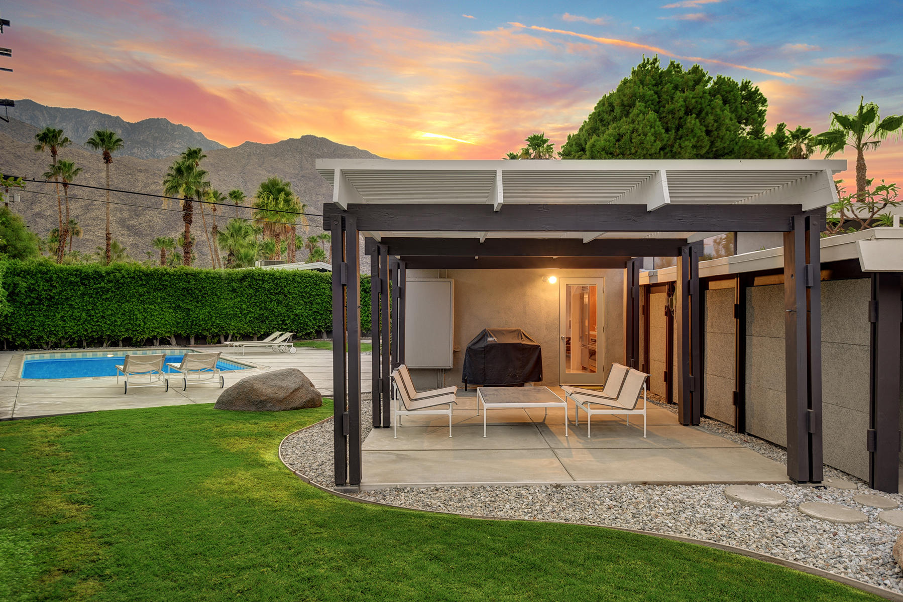 1865 Apache Circle Palm Springs, CA 92264 - Photo 39 of 42 a view of a chair and table in back yard of the house