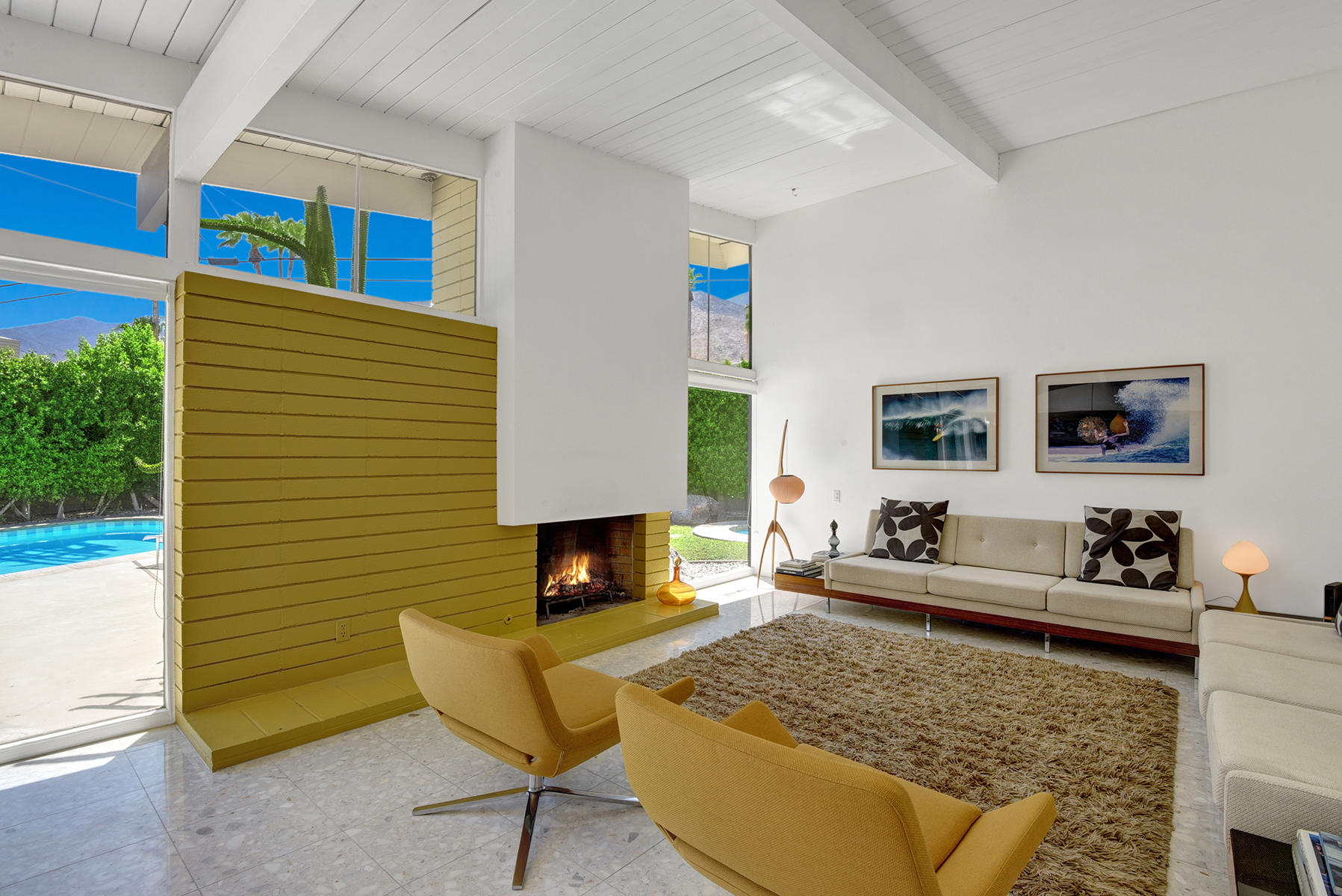 1865 Apache Circle Palm Springs, CA 92264 - Photo 5 of 42 a living room with fireplace furniture and a rug