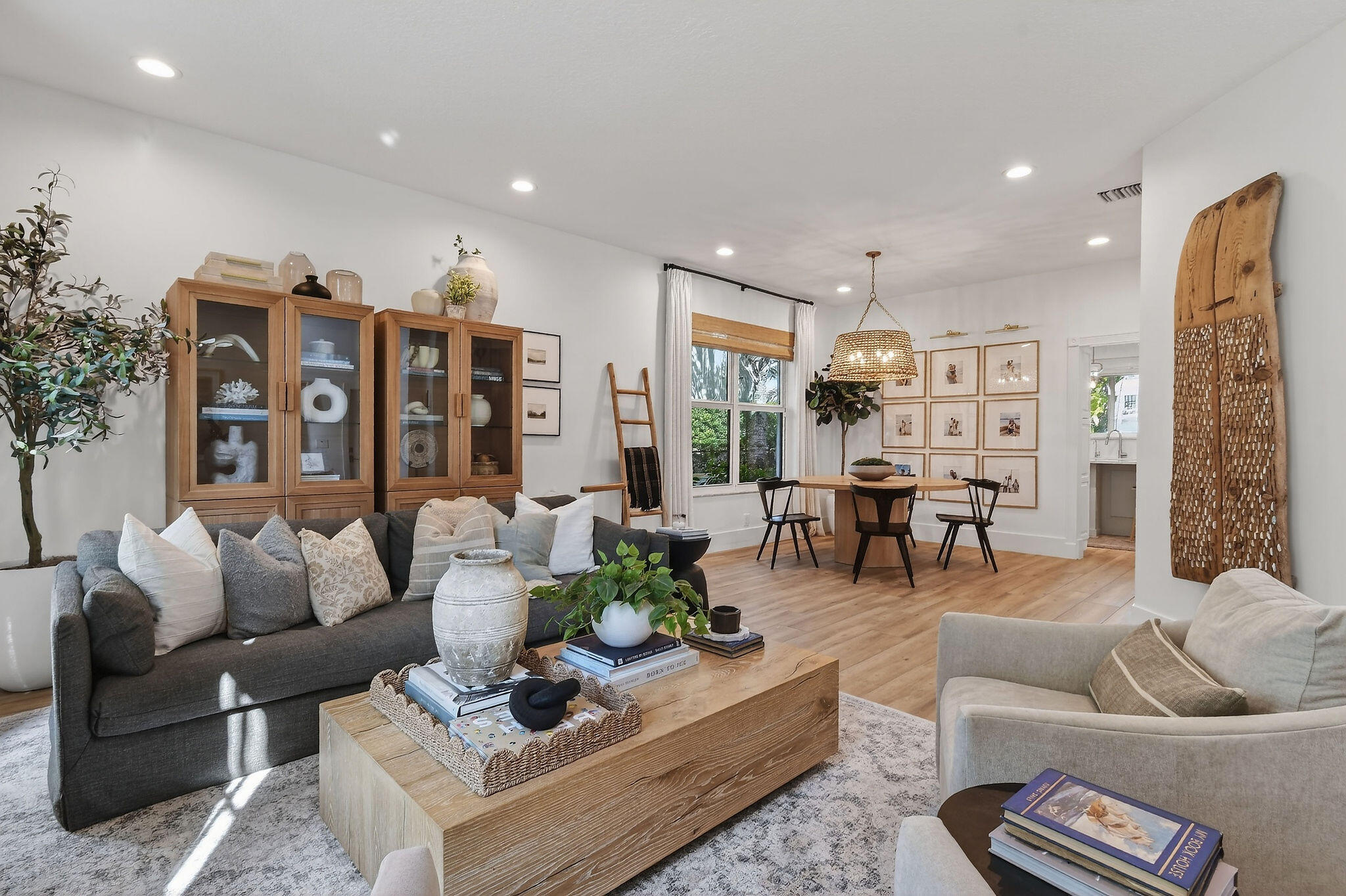 19954 Loxahatchee Pointe Drive Jupiter, FL 33458 - Photo 14 of 60 a living room with furniture kitchen view and a large window