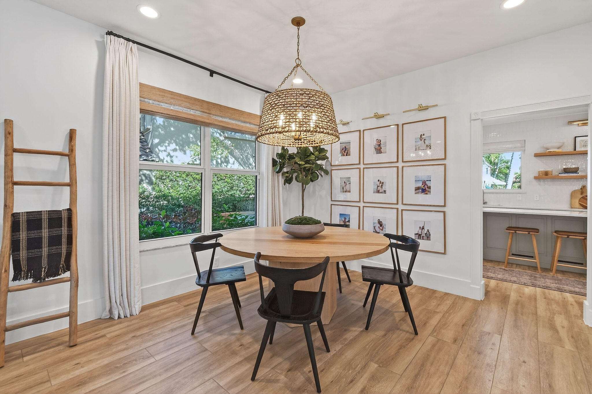 19954 Loxahatchee Pointe Drive Jupiter, FL 33458 - Photo 15 of 60 a view of a dining room with furniture window and wooden floor