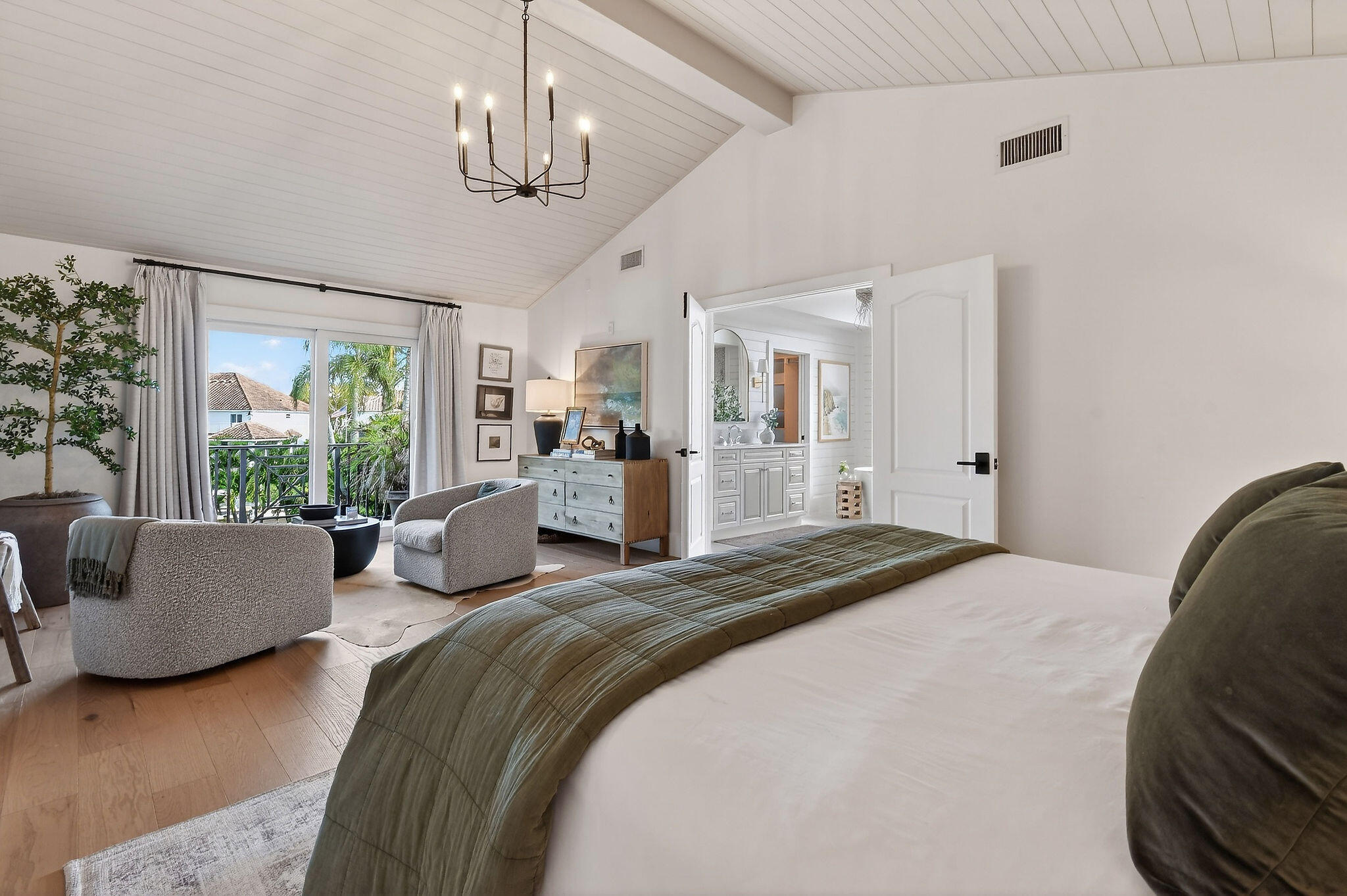 19954 Loxahatchee Pointe Drive Jupiter, FL 33458 - Photo 24 of 60 a spacious bedroom with a bed and ceiling fan