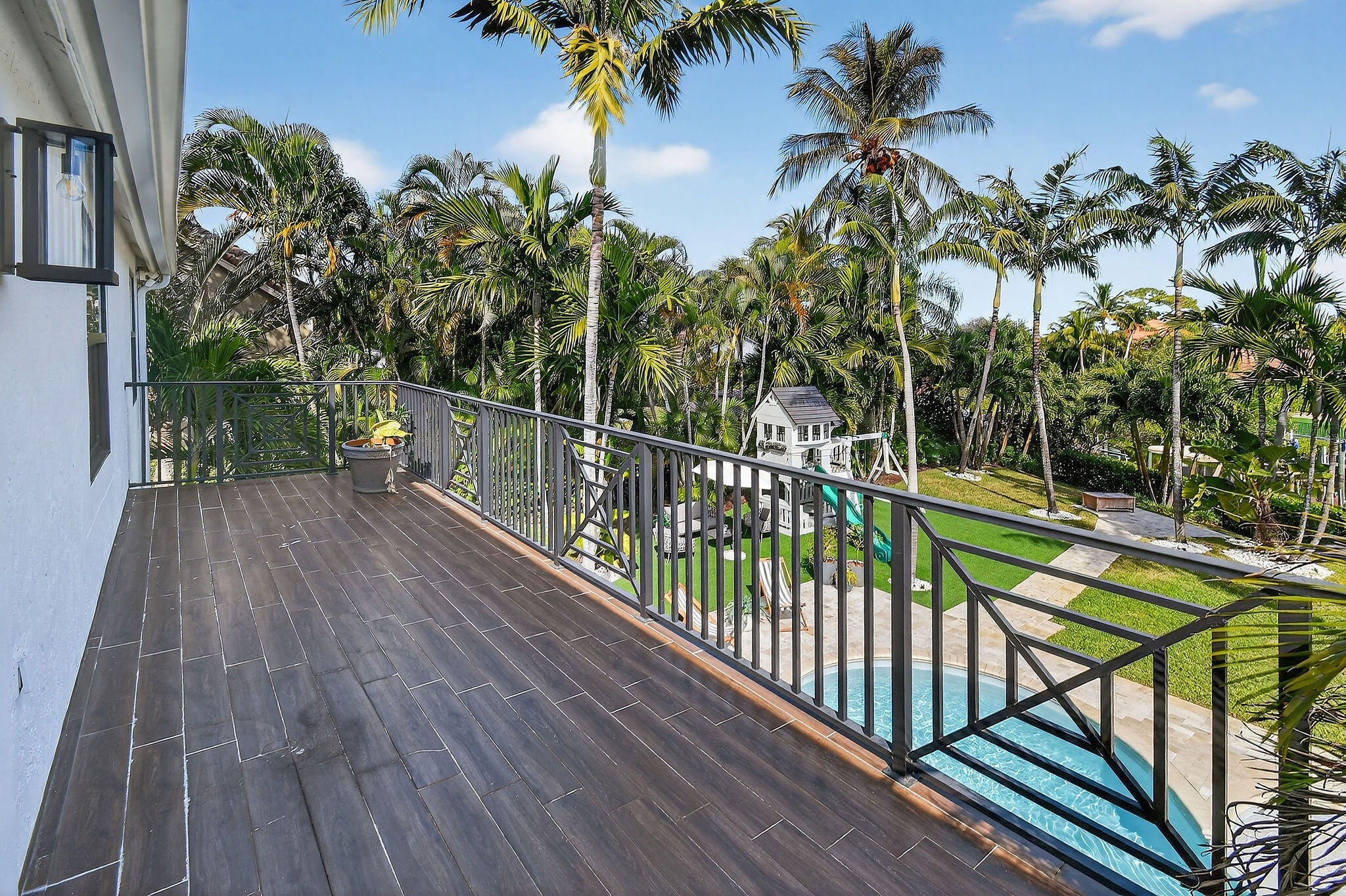 19954 Loxahatchee Pointe Drive Jupiter, FL 33458 - Photo 26 of 60 a view of balcony with wooden floor