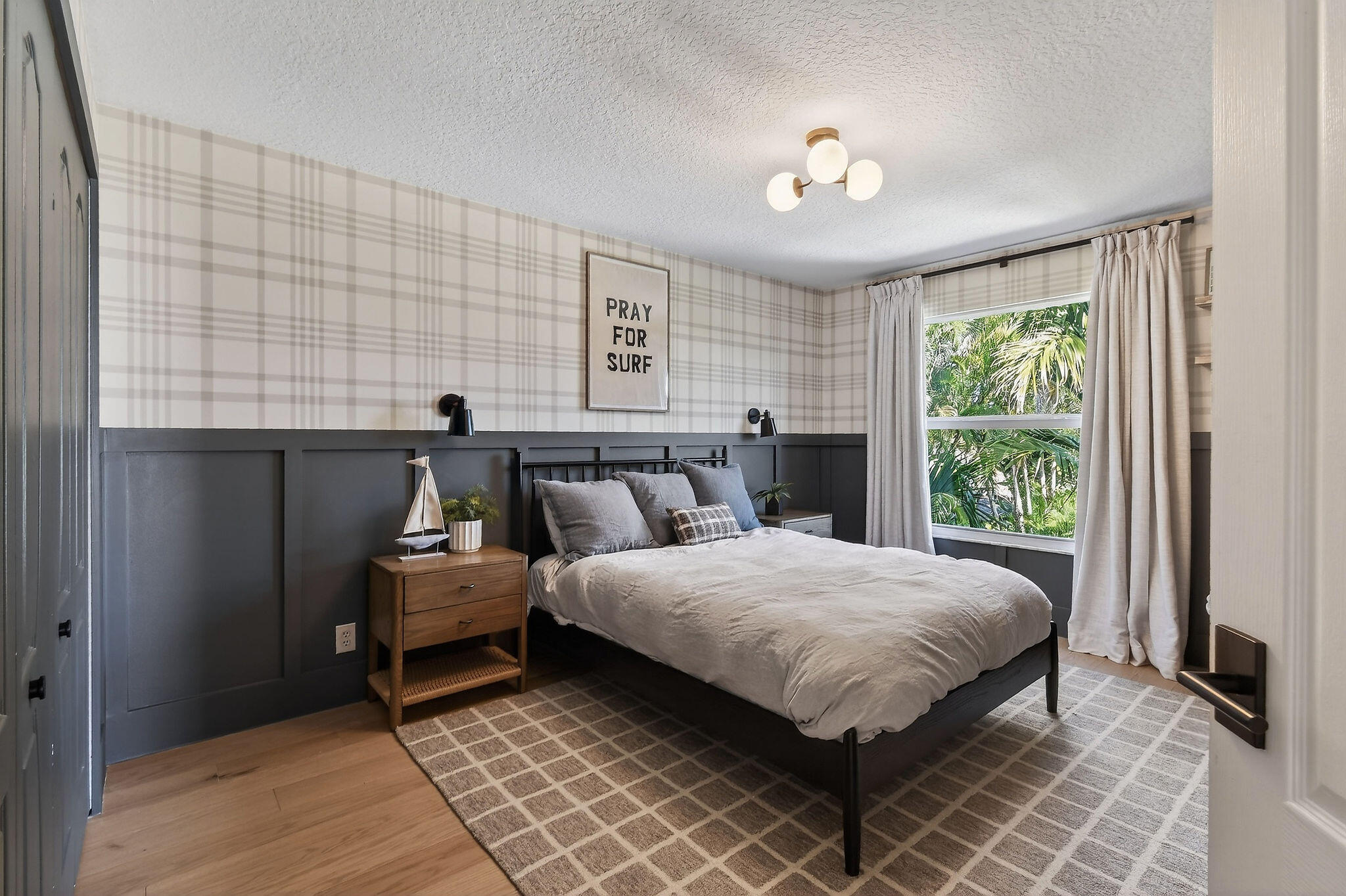 19954 Loxahatchee Pointe Drive Jupiter, FL 33458 - Photo 33 of 60 a bedroom with a bed and window