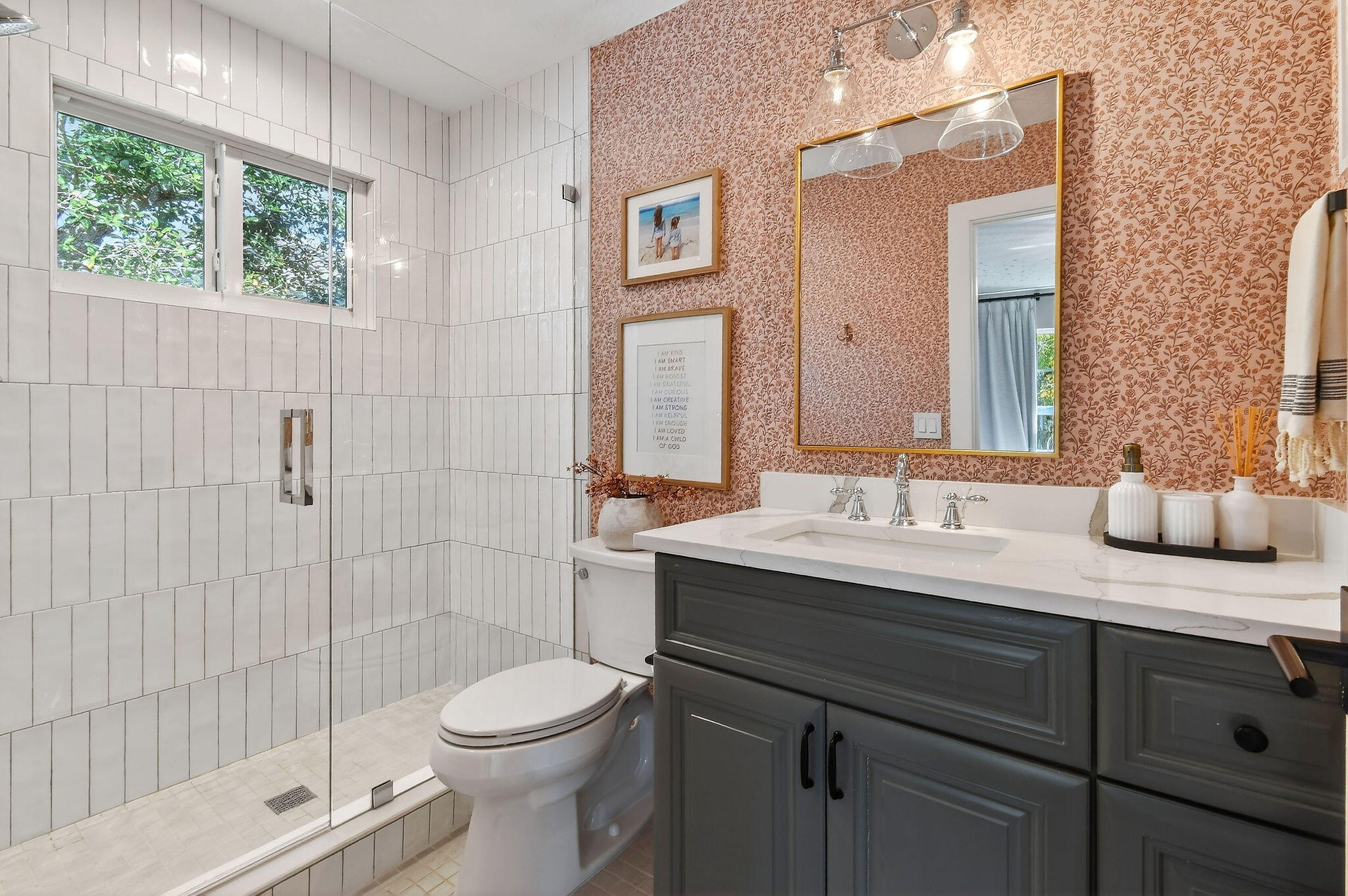 19954 Loxahatchee Pointe Drive Jupiter, FL 33458 - Photo 36 of 60 a bathroom with a granite countertop sink toilet a mirror and shower