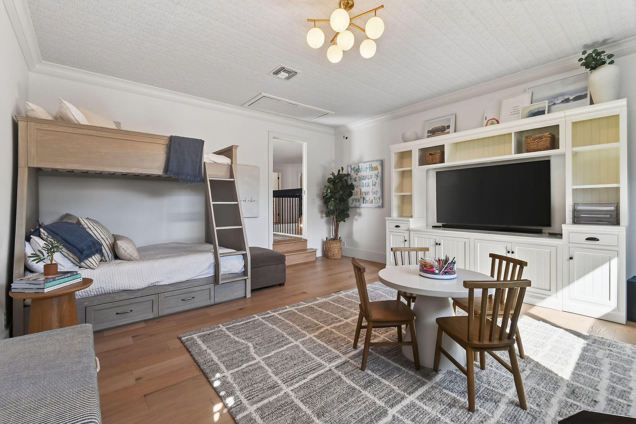 19954 Loxahatchee Pointe Drive Jupiter, FL 33458 - Photo 39 of 60 a view of a livingroom with furniture and a flat screen tv