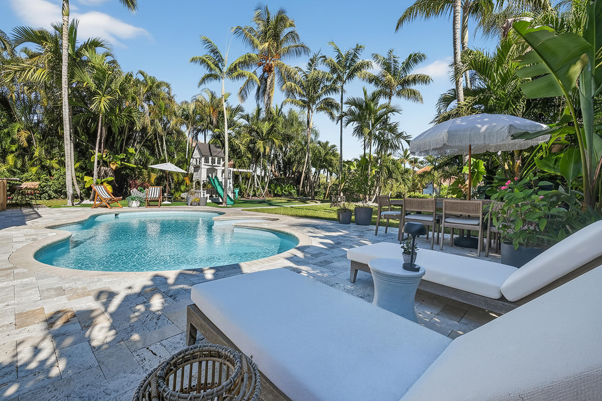 19954 Loxahatchee Pointe Drive Jupiter, FL 33458 - Photo 45 of 60 swimming pool view with a seating space