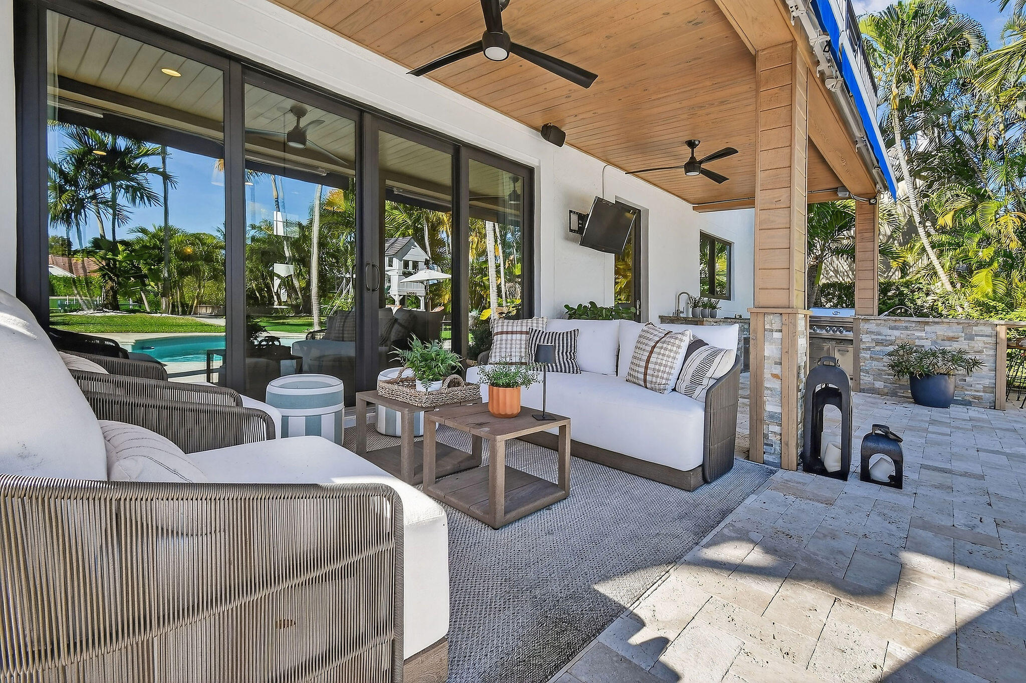 19954 Loxahatchee Pointe Drive Jupiter, FL 33458 - Photo 46 of 60 a living room with furniture and a large window