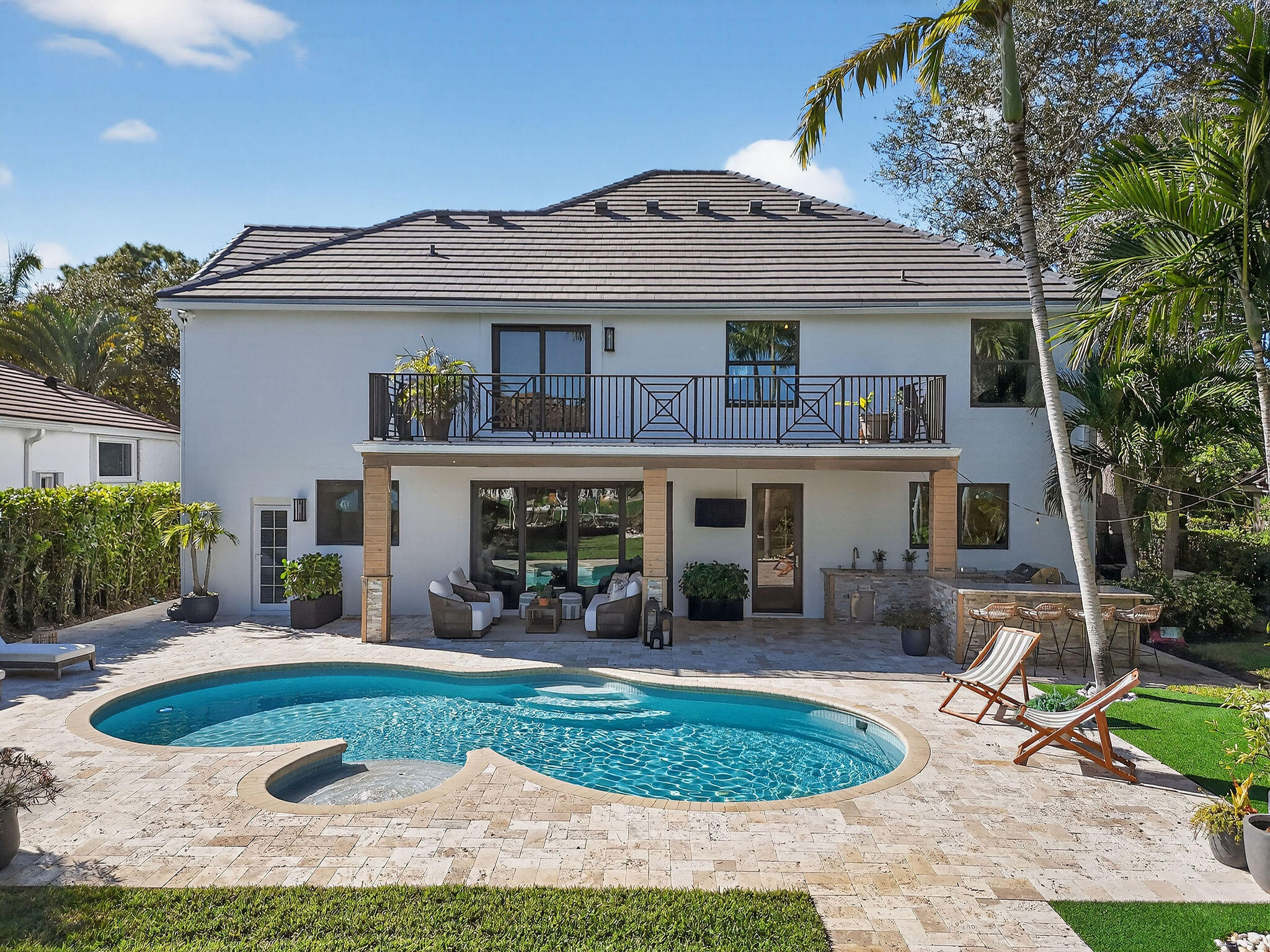 19954 Loxahatchee Pointe Drive Jupiter, FL 33458 - Photo 47 of 60 front view of a house with a yard