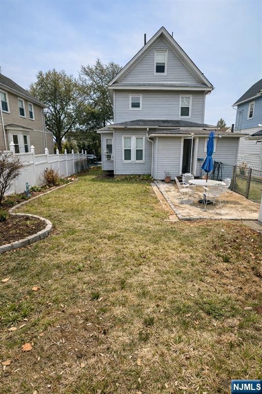 54 College Place Ridgefield Park, NJ 07660 - Photo 17 of 18 a front view of a house with a yard