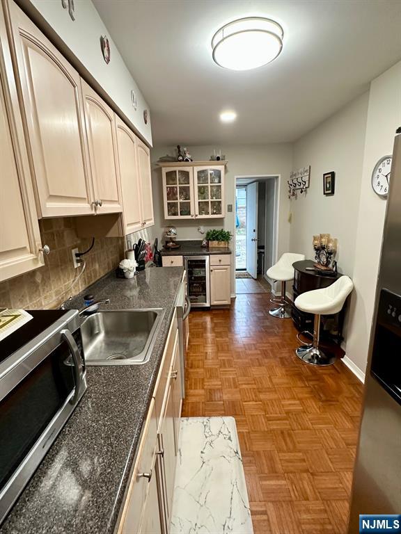 54 College Place Ridgefield Park, NJ 07660 - Photo 4 of 18 a kitchen with a sink and a stove top oven