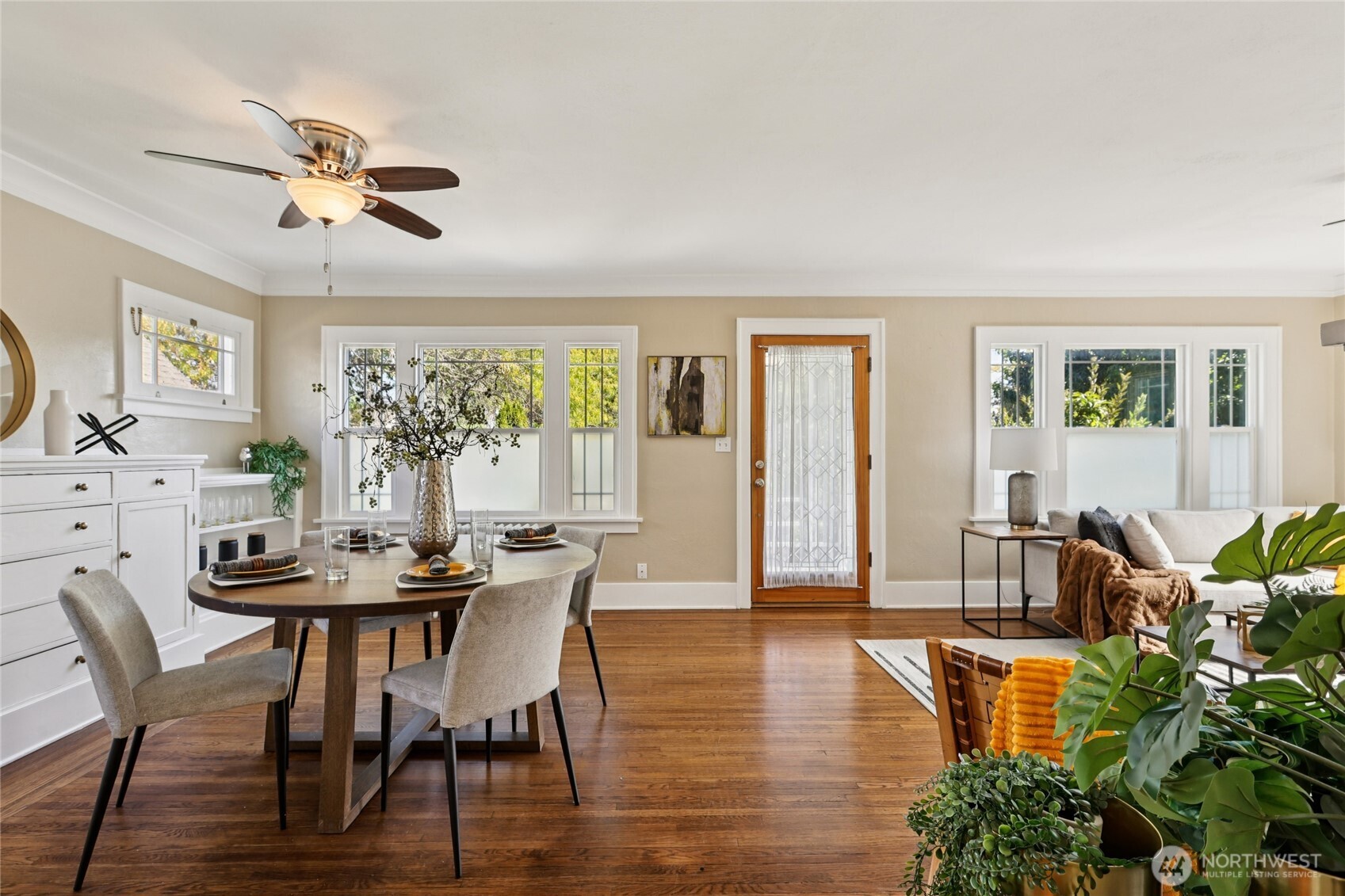 511 23rd Avenue East Seattle, WA 98112 - Photo 11 of 39 a view of a dining room with furniture window and wooden floor