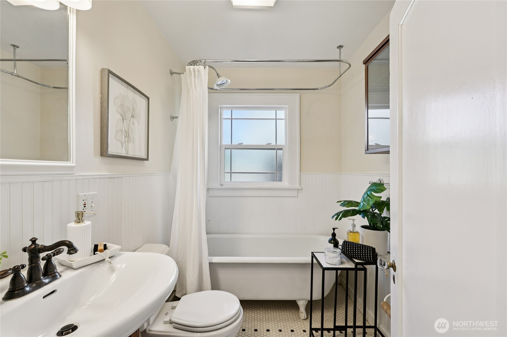 511 23rd Avenue East Seattle, WA 98112 - Photo 19 of 39 a bathroom with a sink toilet and shower