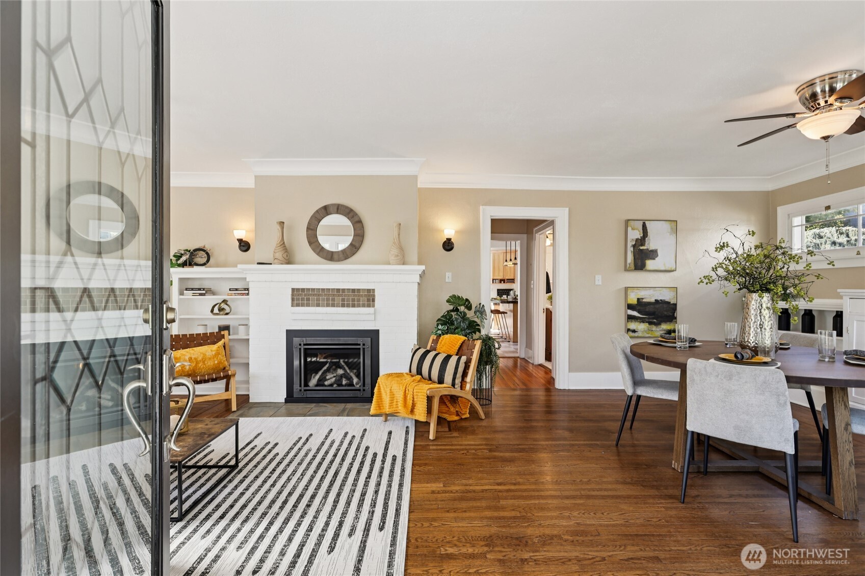 511 23rd Avenue East Seattle, WA 98112 - Photo 3 of 39 a living room with furniture and a fireplace