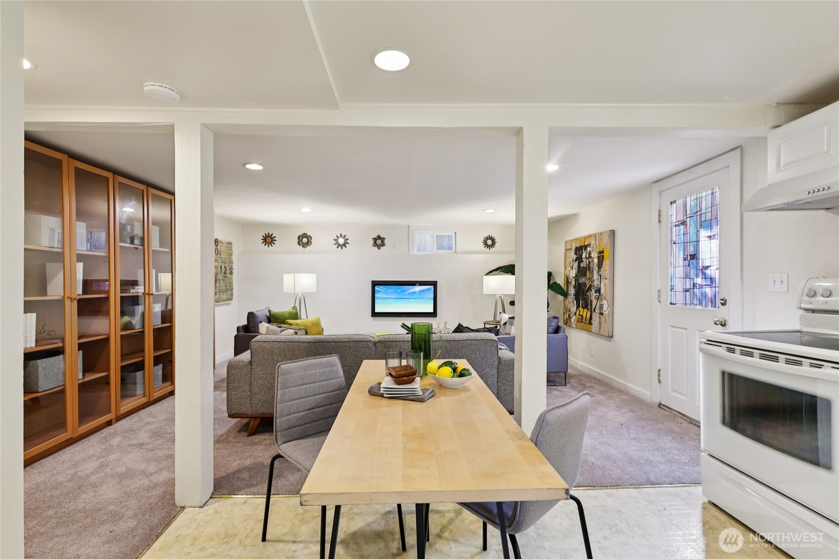 511 23rd Avenue East Seattle, WA 98112 - Photo 35 of 39 a view of a dining room with furniture window and wooden floor