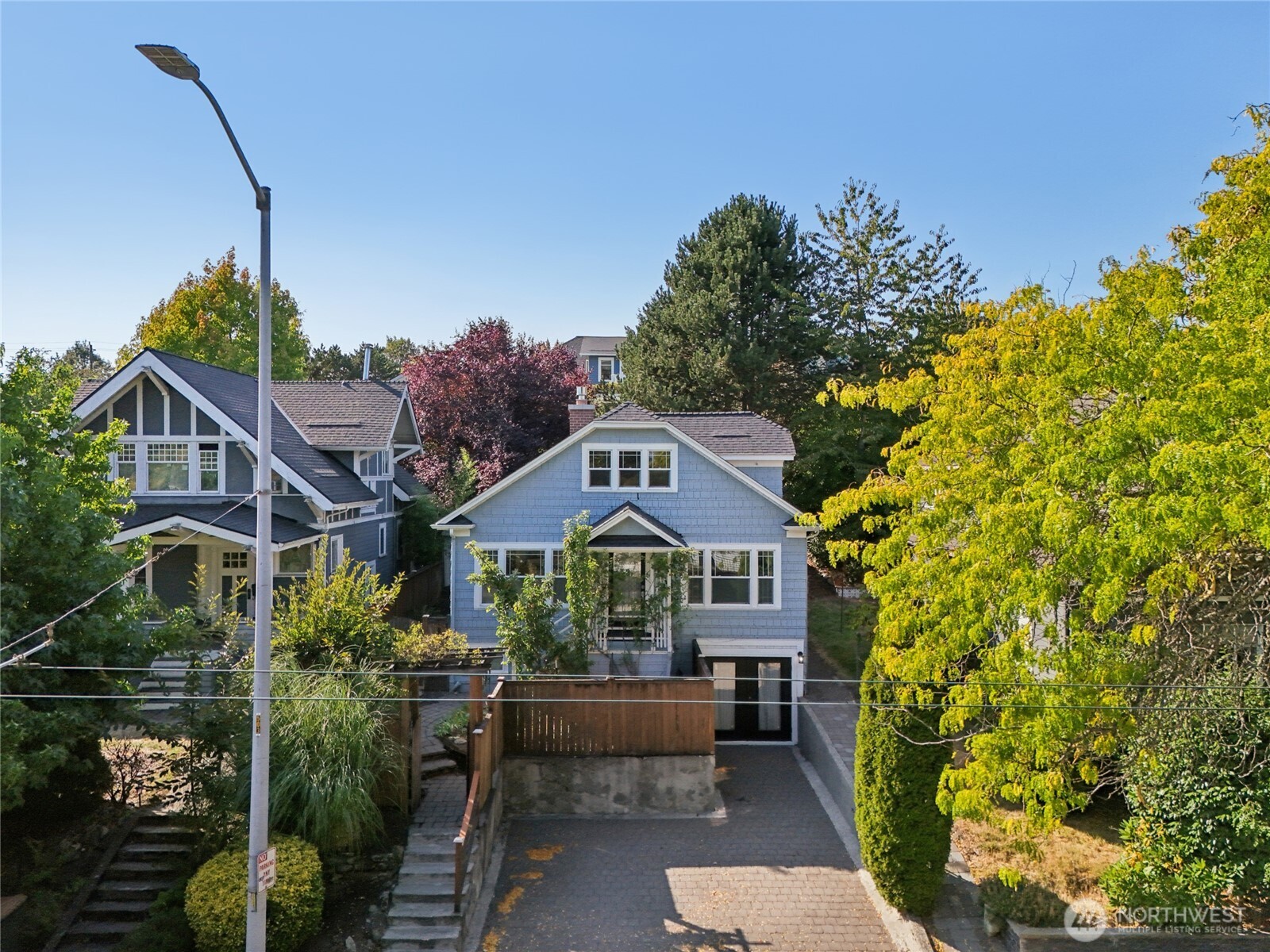 511 23rd Avenue East Seattle, WA 98112 - Photo 38 of 39 a front view of a house with a yard