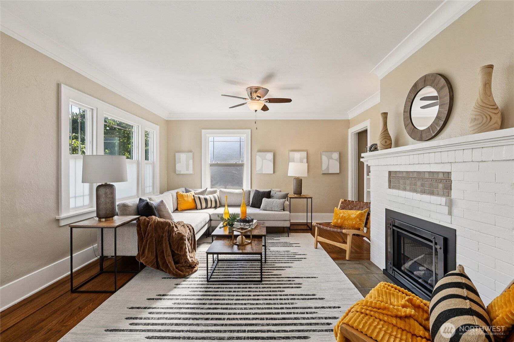 511 23rd Avenue East Seattle, WA 98112 - Photo 4 of 39 a living room with furniture a fireplace and a window
