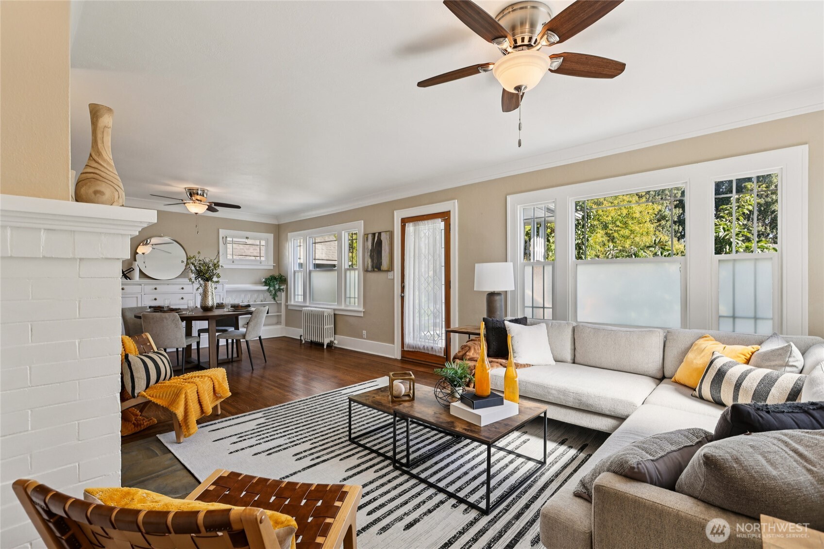 511 23rd Avenue East Seattle, WA 98112 - Photo 5 of 39 a living room with furniture and a large window