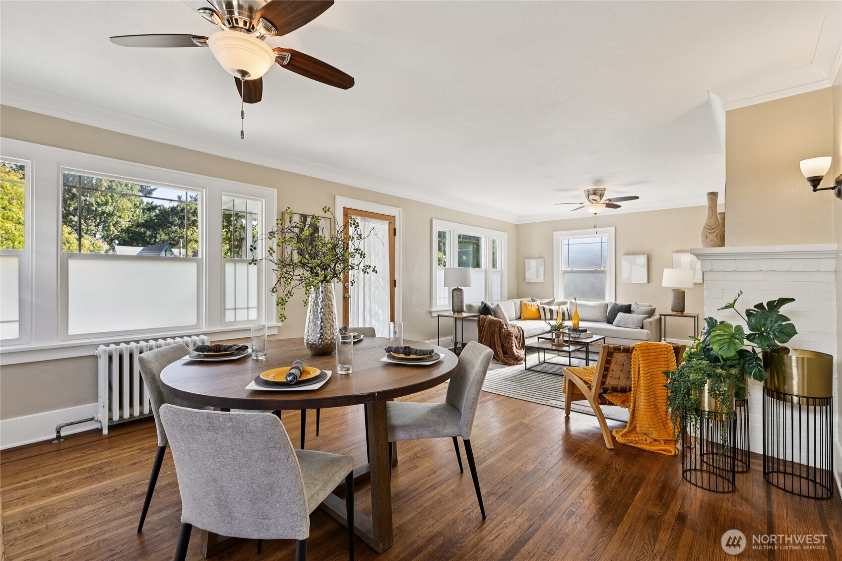 511 23rd Avenue East Seattle, WA 98112 - Photo 10 of 39 a dining room with furniture window and wooden floor
