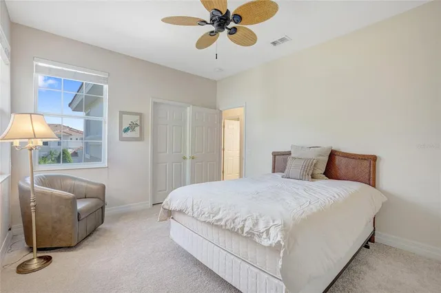 an aerial view of residential houses with yard