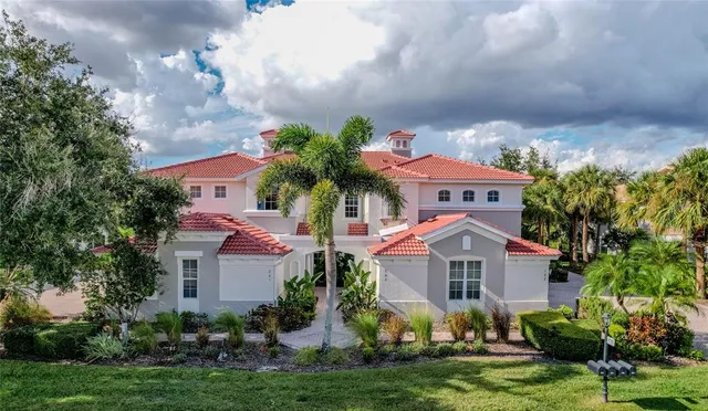 a view of a lake with a house in the background