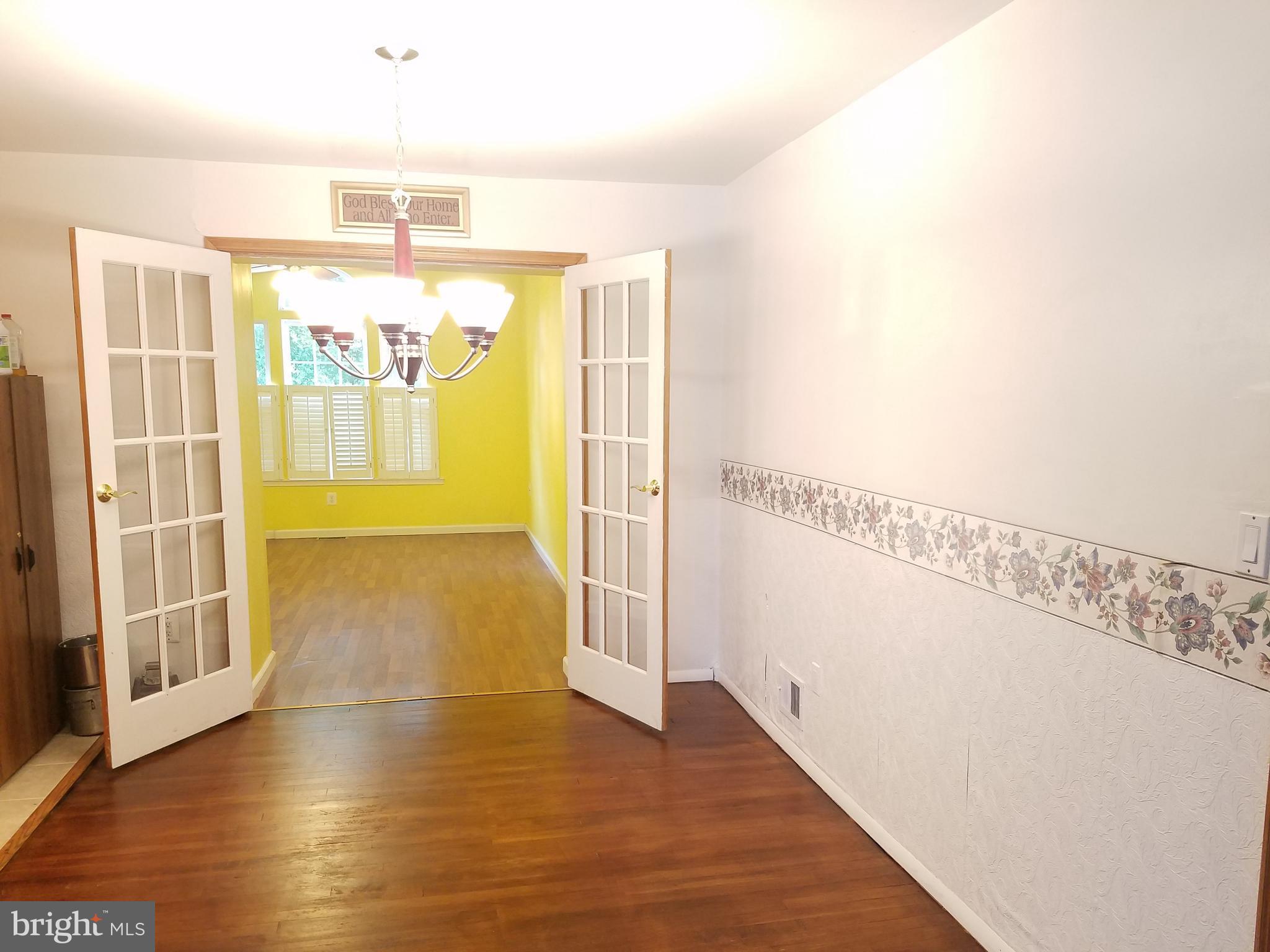 7910 Legation Road New Carrollton, MD 20784 - Photo 4 of 26 Living Room/Dining Room