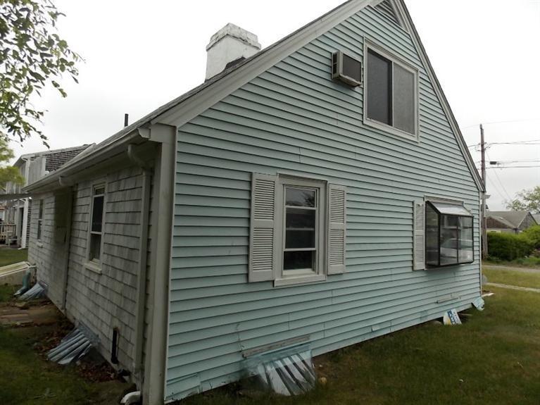 22 Iyanough Road Hyannis, MA 02601 - Photo 3 of 17 a view of a house with a yard